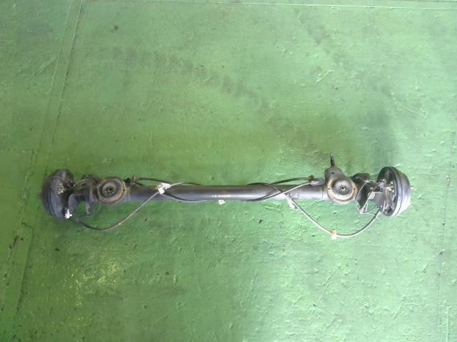 [R AXLE BEAM ASSY]NISSAN MOCO MG33S R06A AT 2WD #0BD3253181641